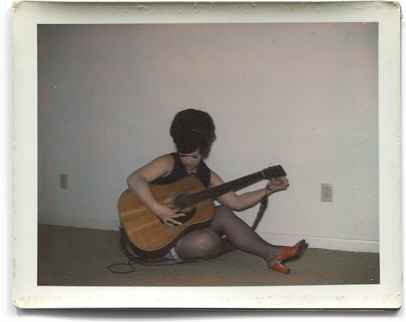 Dell Rose with her guitar, circa 1973